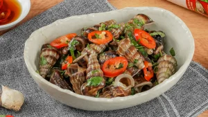 Ốc len xào dừa – hương vị biển từ phường Bình Đại, TP Vĩnh Long